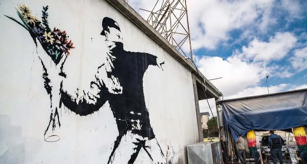 Slim Wooden Phone Case (Banksy Molotov Flowers in Mahogany)